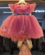Розовое пышное детское платье с серебряным бантом